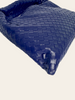 Bottega Veneta Hop Small Duke Navy Intrecciato — detail: close-up angled view showing the hand-woven Intrecciato leather texture.