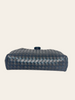 Bottega Veneta Lauren 1980 Clutch Black Intrecciato — back view showing the rounded frame clasp knob on top.