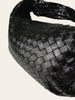 Bottega Veneta Small Jodie Black Intrecciato — detail: close-up of the woven leather texture, showing light surface wear consistent with the item's pre-owned condition.