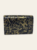 Chanel Calfskin Crocodile Embossed Graffiti 2.55 Reissue Flap Card Holder Black Gold — back view showing the crocodile-embossed graffiti pattern.