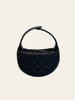 Chanel Polly Pocket Hobo Black Caviar — back view showing the plain quilted round silhouette and top handle.