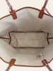 Goyard Saint Louis PM Natural Goyardine — interior view: The natural canvas lining with a center pocket and tan trim.