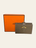 Hermès Béarn Mini Wallet Etoupe Epsom Gold Hardware — styled next to its original orange Hermès box.