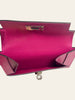 Hermès Kelly Pocket Compact Wallet Rose Pourpre Epsom — interior view: a second angle of the open flap and turn-lock mechanism.