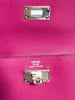 Hermès Kelly Pocket Compact Wallet Rose Pourpre Epsom — interior detail: close-up of the blind stamp plate alongside the 'HERMÈS PARIS MADE IN FRANCE' stamp and turn-lock hardware.