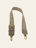 Loewe Anagram Strap in Jacquard and Calfskin Sand Gold — full view showing the strap's length and gold hardware.