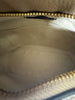 Loewe Small Puzzle Sand Calfskin — interior view: The cream canvas lining.